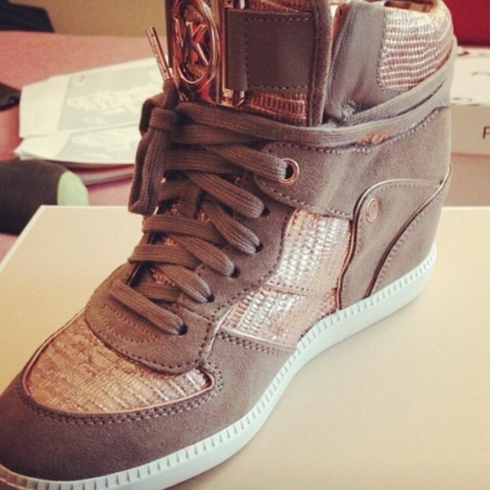 Michael kors heeled sneakers.